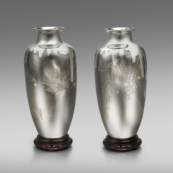 Pair of shibuichi and silver vases with pine and plum trees