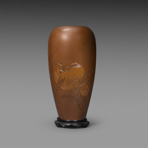 Copper vase with birds at riverside